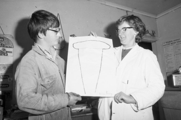 Brian Perry, 15, and his mother, Kathleen, hold a drawing Brian made of the object.