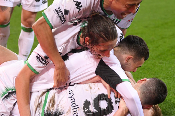 Western United players celebrate.