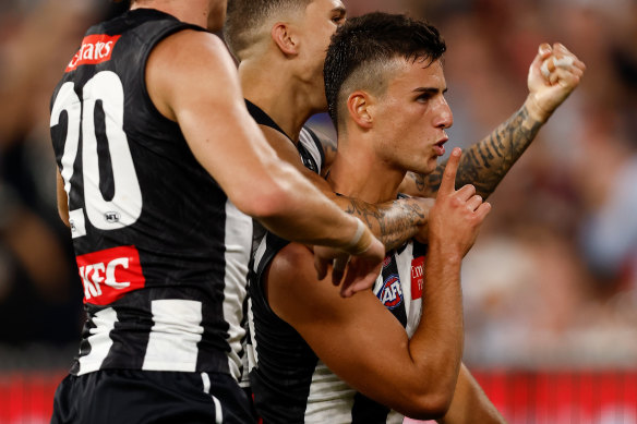 Nick Daicos celebrates. 