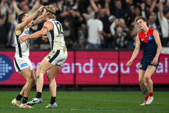 Sheer joy: The Blues react after the final siren.