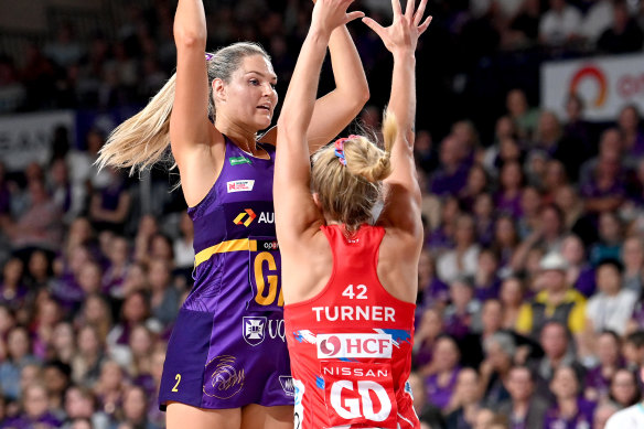 Gretel Bueta of the Queensland Firebirds in action against the NSW Swifts in round one.
