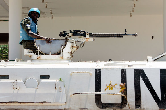 A UN peacekeeper from Ghana sits atop an armoured vehicle in Naqoura in southern Lebanon after the ceasefire in 2006.