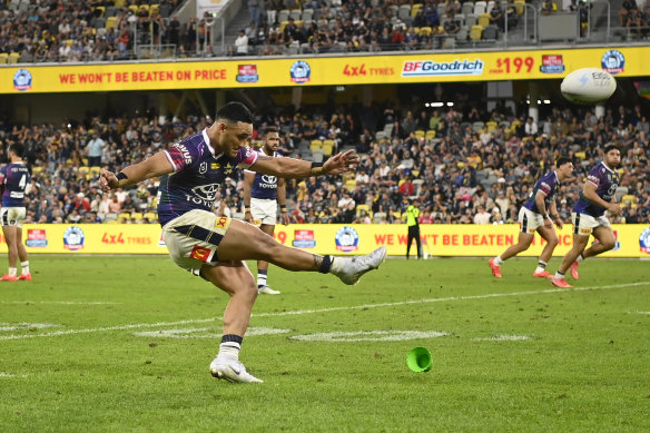 Valentine Holmes kicks the controversial winning penalty against the Wests Tigers.