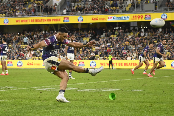 Valentine Holmes kicks the controversial winning penalty.