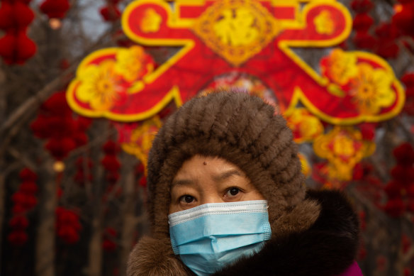 The coronavirus threat cast a pall over Lunar New Year celebrations in Beijing.
