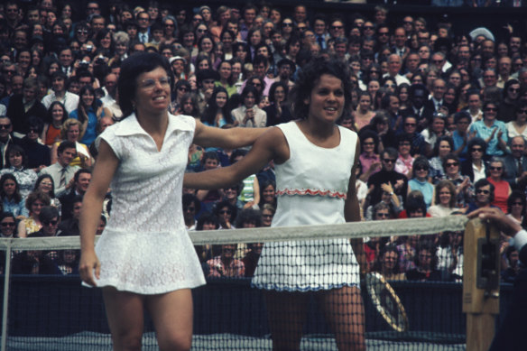 Billie-Jean King and Evonne Goolagong leave the court after King’s fourth Wimbledon victory. July 7, 1972.