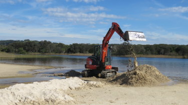 The Tallow Creek estuary being opened to the sea on June 14 by the Byron Bay Council.