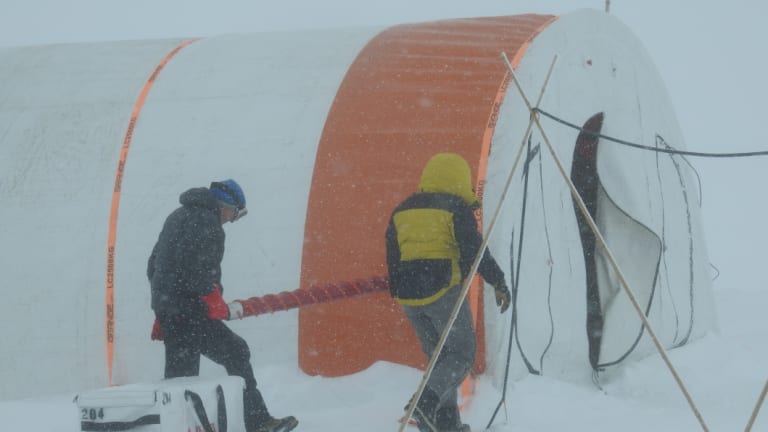 David Etheridge and colleague working in a blizzard at Law Dome.