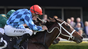 Hitting the gap: Funstar charges to victory for Jay Ford after a chequered passage in the straight.