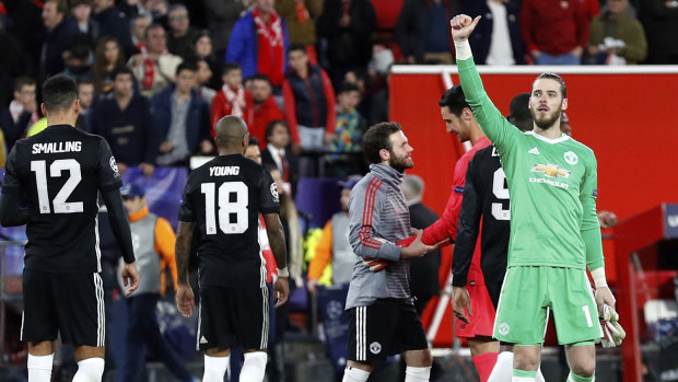 Manchester United goalkeeper David de Gea gestures to fans after the draw with Sevilla.