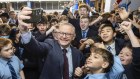 Anthony Albanese visits his alma mater in Sydney on Monday ... the community’s desire for change is obviously very strong.