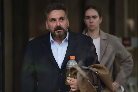 Convicted fraudster George Alex leaves court in Sydney. He was granted bail last year despite a hefty prison sentence.