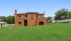 The deceased estate home with shed on a site comprising three separate titles at 7 Churchill Street in the Ipswich,] Queensland suburb of Churchill sold at auction for $1,050,000.
