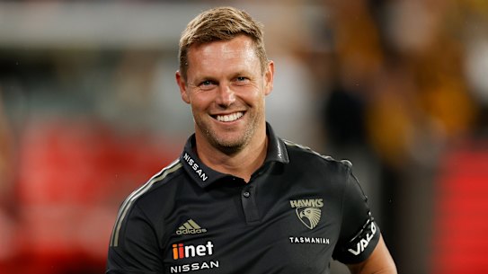 MELBOURNE, AUSTRALIA - APRIL 18: Sam Mitchell, Senior Coach of the Hawks celebrates during the 2022 AFL Round 05 match between the Hawthorn Hawks and the Geelong Cats at the Melbourne Cricket Ground on April 18, 2022 In Melbourne, Australia. (Photo by Michael Willson/AFL Photos via Getty Images)