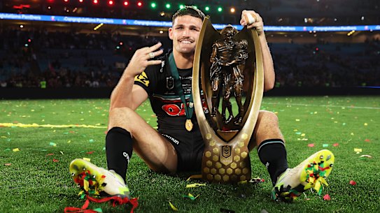 Nathan Cleary celebrates with the trophy.