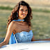 Arriving anywhere via canal boat is always going to add a touch of glamour. Romanian model Loredana Salanță was a vision in this pale blue embellished gown, complete with a cape, on September 8.