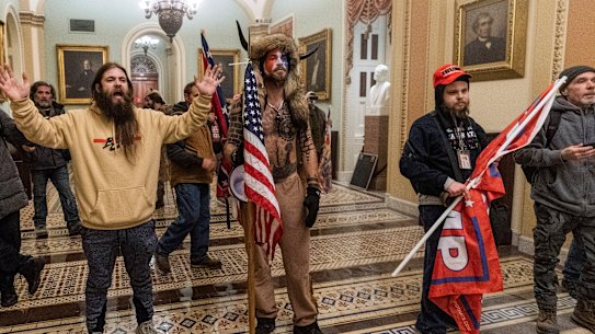 Supporters of President Donald Trump are confronted by U.S. Capitol Police officers 