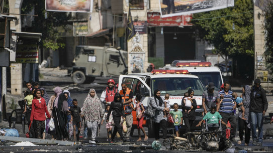Residents of the Jenin refugee camp fled their homes as the Israeli military pressed ahead with an operation in the area yesterday,