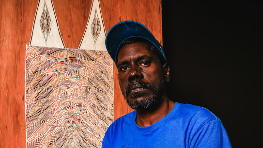 Wurrandan Marawili, with his artwork Rumbal, the body/the truth.