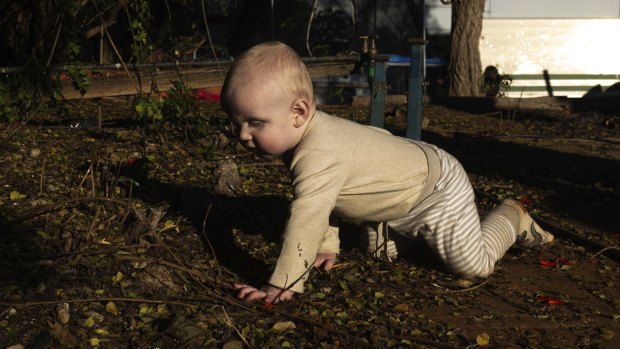 In the shadow of a mining giant, children crawl in poison