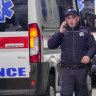 Police block the street around the Vladislav Ribnikar school in Belgrade, Serbia, on Wednesday.