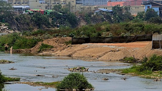 KK Park in Myanmar, known for its scam compounds, is seen across the Moei River on the Myanmar–Thailand border.