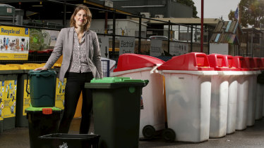 Yarra Council mayor Danae Bosler with some of the recycling bins.