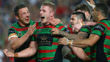 George Burgess celebrates his try in South Sydney’s 2014 grand final triumph.