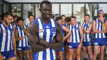 North Melbourne's Majak Daw returns to Arden Street for the coming season's team photo. 