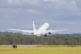 A Royal Australian Air Force P-8 Poseidon aircraft takes off from Amberley airbase on Monday to assist the Tonga government after the eruption of an undersea volcano. 