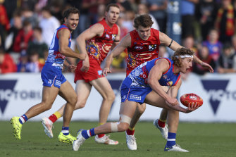 Aaron Naughton, right, was instrumental for the Bulldogs. 