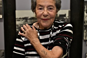 Auschwitz survivor Lotte Weiss shows her tattoo number in 2015, aged 91.