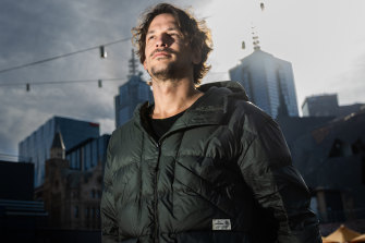 Australian model Jarrod Scott wearing the BioDown biodegradable puffer jacket from Kathmandu.