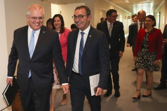 Scott  Morrison with state and territory leaders after the first in-person national cabinet meeting, in December.