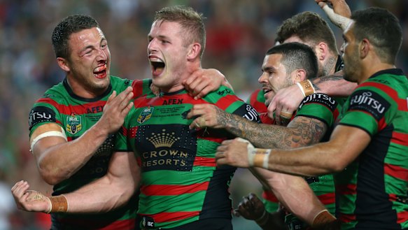 George Burgess celebrates his try in South Sydney’s 2014 grand final triumph.