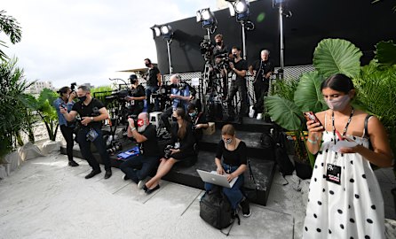 The media riser before the Jason Wu fashion show during New York Fashion Week this month. Thousands of related workers such as photographers rely on fashion weeks for a sizable part of their incomes.