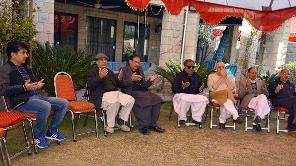 Relatives and neighbours in Abbottabad, Pakistan, pray for Pakistani citizens Naeem Rashid and his son Talha Naeem, who were killed in the Christchurch mosque shooting.