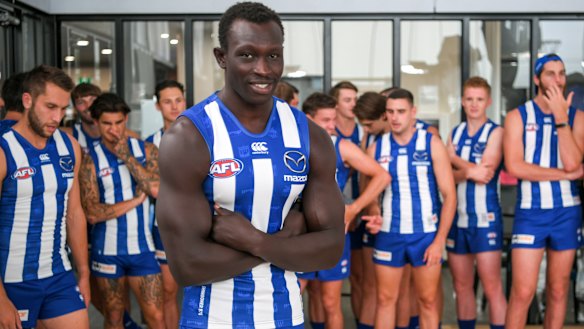 North Melbourne's Majak Daw returns to Arden Street for the coming season's team photo. 