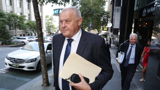 Former Victoria Police homicide detective Ron Iddles leaves the Royal Commission on Thursday.
