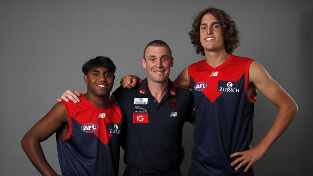 New Demons: Melbourne coach Simon Goodwin with draftees Luke Jackson (right) and Kozzie Pickett. 