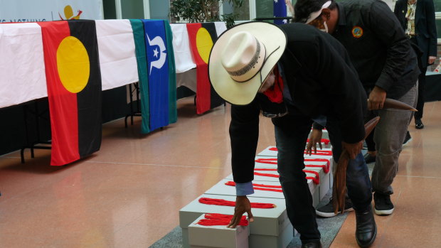 Yawuru law boss Neil McKenzie leads a remains repatriation ceremony at the Australian embassy in Berlin on Monday. 