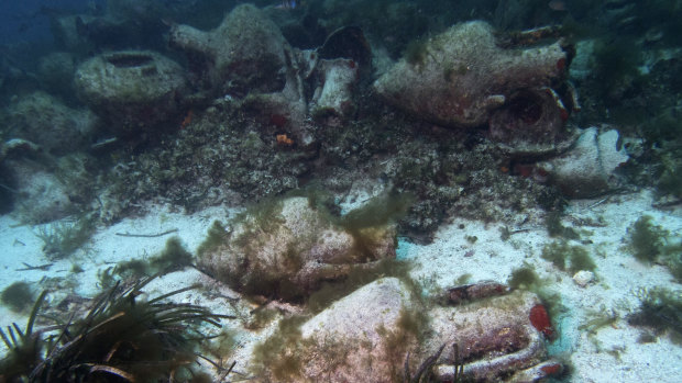Ancient amphoras at the bottom of the sea from a 5th century BC shipwreck. Recreational divers will be able to visit the wreck near the coast of Peristera, Greece. 