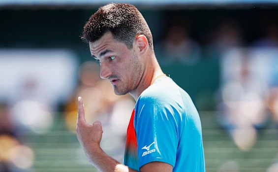 Bernard Tomic gestures while playing Nick Kyrgios at Kooyong.