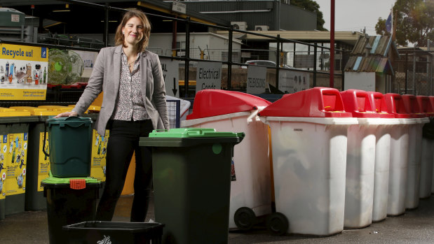 Yarra Council mayor Danae Bosler with some of the recycling bins.