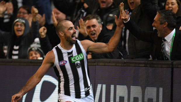 Steele Sidebottom scores a high five after one of his goals.