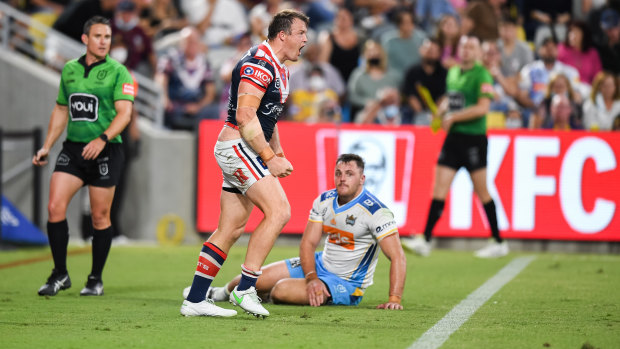 Not done yet ... Sydney Roosters centre Josh Morris celebrates a try against the Gold Coast Titans last week.