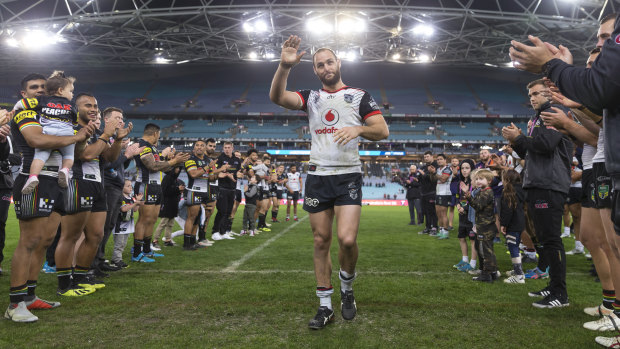 Club legend: Simon Mannering is clapped off the field after a career spanning 301 NRL games.