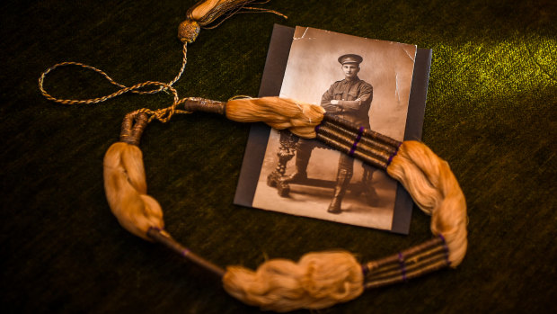 Moira Christie's grandfather James Harrison and the piece of headdress she believes belonged to Lawrence of Arabia.