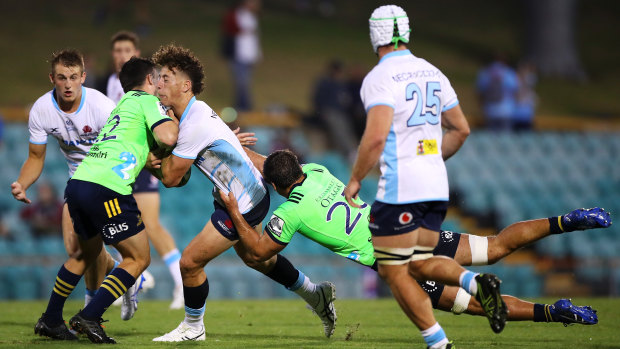 Mark Nawaqanitawase in action for the Waratahs on Friday evening at Leichhardt Oval. 