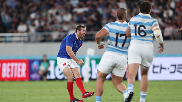 Sealing the deal: Camille Lopez kicks the winning drop goal for France against the Pumas.